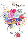 Mother's Day card illustration that presents a spirited bouquet of flowers painted in flowing watercolour, capturing the gentle energy of a fresh spring morning in Merton. At the centre, vibrant pink and cerise blooms open wide, their petals brushed with deeper indigo shadows that hint at layers and texture. Surrounding them, more delicate blossoms in lavender, blue, apricot, and soft peach interweave with leafy shapes, each stroke slightly blurred at the edges where the colours blend, echoing the way watercolours naturally bleed into one another. Fine, gleaming accents of gold follow the curves of some petals and leaves, adding a subtle touch of elegance and warmth, much like the golden evening light that falls across local streets from Wimbledon to Mitcham. The bouquet sits in a gently rounded vase at the base of the image, its silhouette suggested with pale grey and blue tints, finished with a slim golden ribbon tied in a neat bow, reminiscent of the care taken when wrapping arrangements at Florist Merton before a doorstep delivery. Around the flowers, the white background is enlivened by tiny hearts, playful paint splashes, and dots of colour, conveying a sense of happiness and festive cheer, as if petals had been thrown into the air in celebration. The card's overall mood is tender and uplifting, an illustrated expression of gratitude and love. It feels like a paper bouquet that could accompany real blooms sent to a mum enjoying a quiet afternoon at home in Merton, or gathering with family near the green spaces and riverside walks that characterise the area.